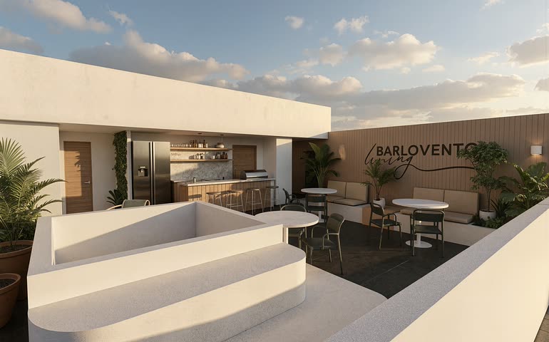 Rooftop de Barlovento Living con barra, comedores al aire libre y el letrero del proyecto