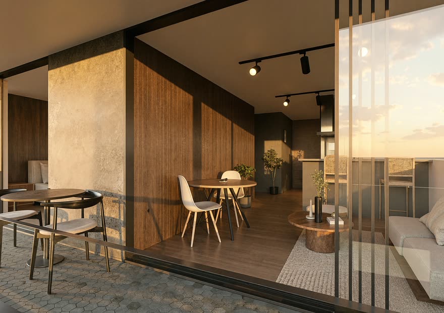 Comedor y cocina de un apartamento de Barlovento Living, con puertas corredizas a la terraza
